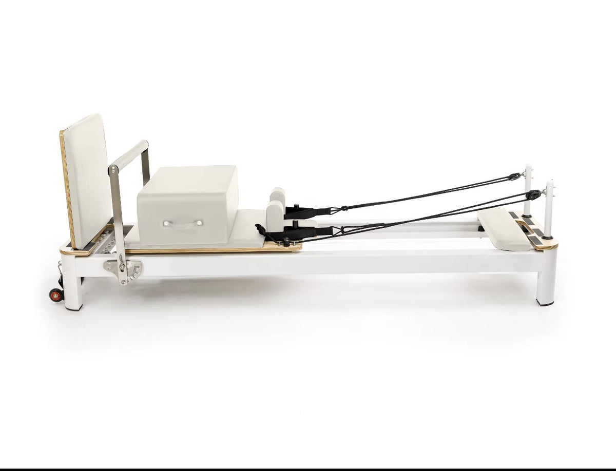White folding Pilates reformer extended, supplier product image